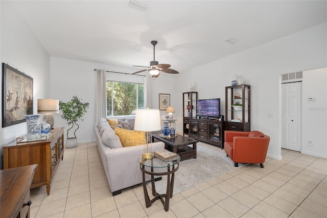 tiled living room with ceiling fan