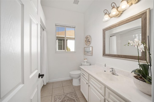 bathroom with tile patterned flooring, vanity, a shower with shower curtain, and toilet