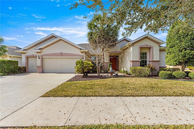 single story home with a garage and a front yard