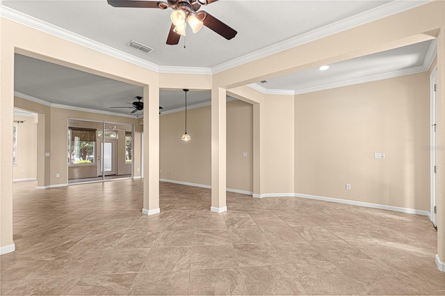 empty room featuring crown molding and ceiling fan