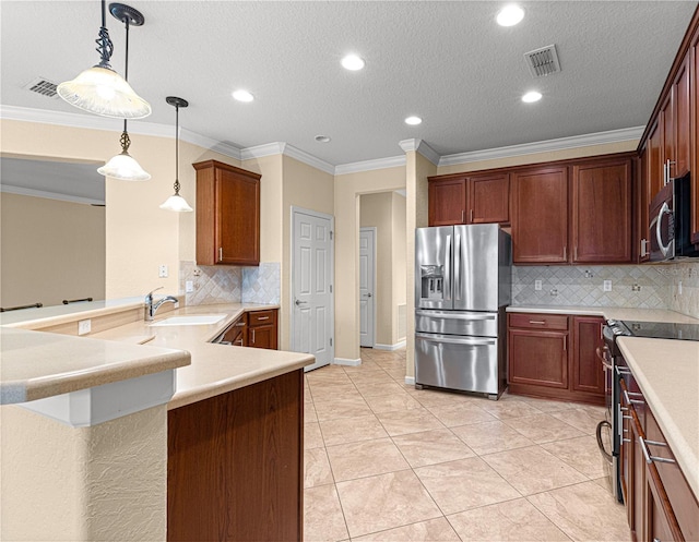 kitchen with hanging light fixtures, ornamental molding, sink, and appliances with stainless steel finishes