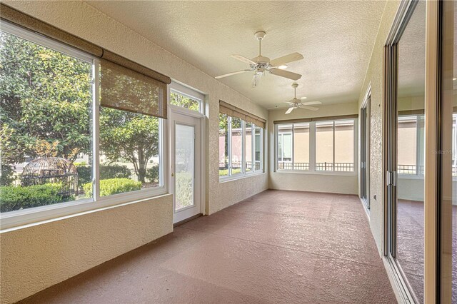 unfurnished sunroom featuring plenty of natural light