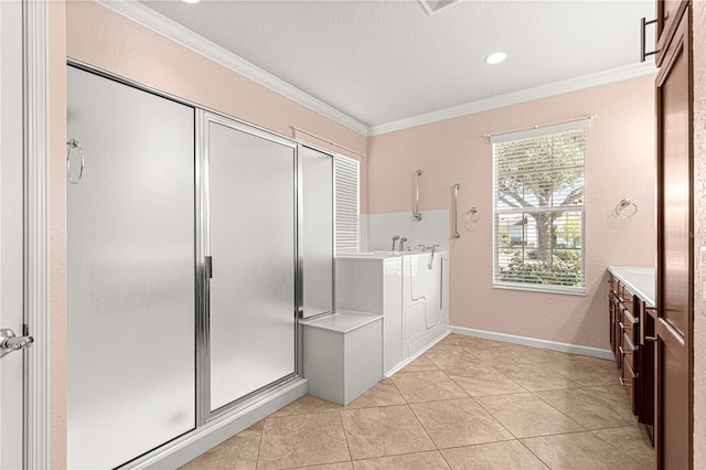 bathroom with vanity, a shower with door, ornamental molding, and tile patterned floors