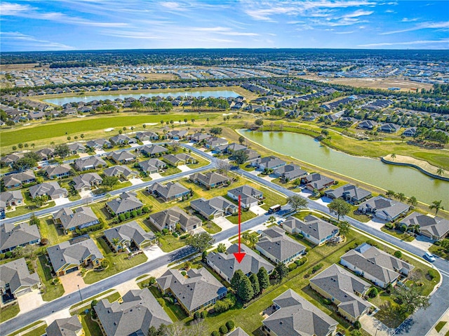 aerial view featuring a water view