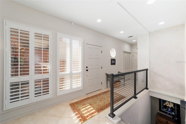 view of tiled foyer entrance