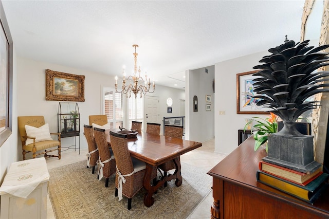 dining room featuring an inviting chandelier