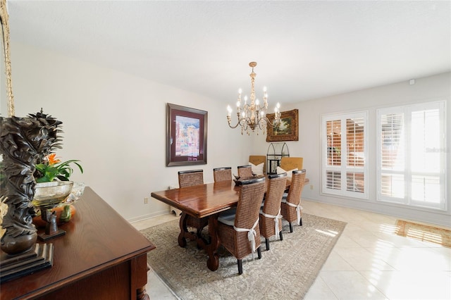 dining space featuring a notable chandelier