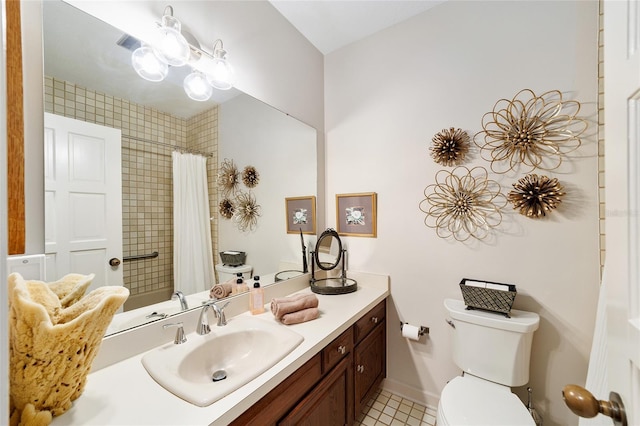 bathroom featuring vanity, a shower with curtain, and toilet