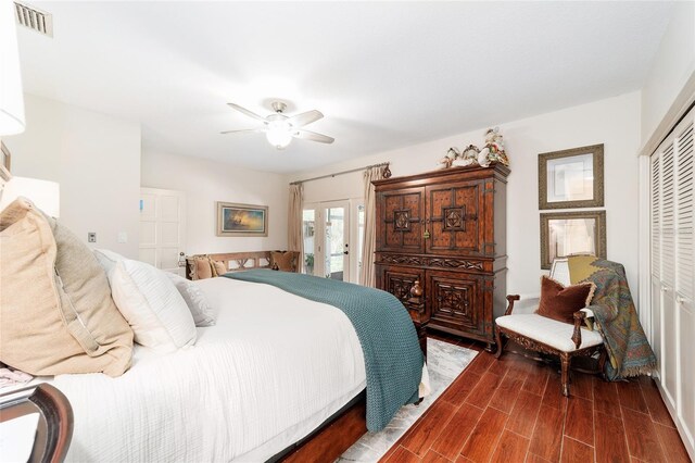 bedroom featuring access to outside, ceiling fan, and a closet