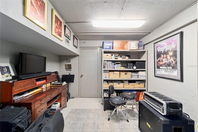 home office with a textured ceiling