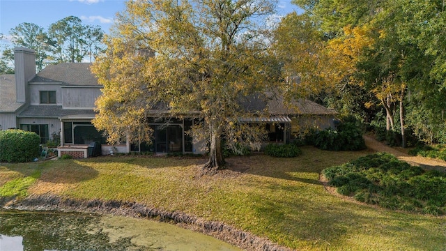 view of front of home with a front yard