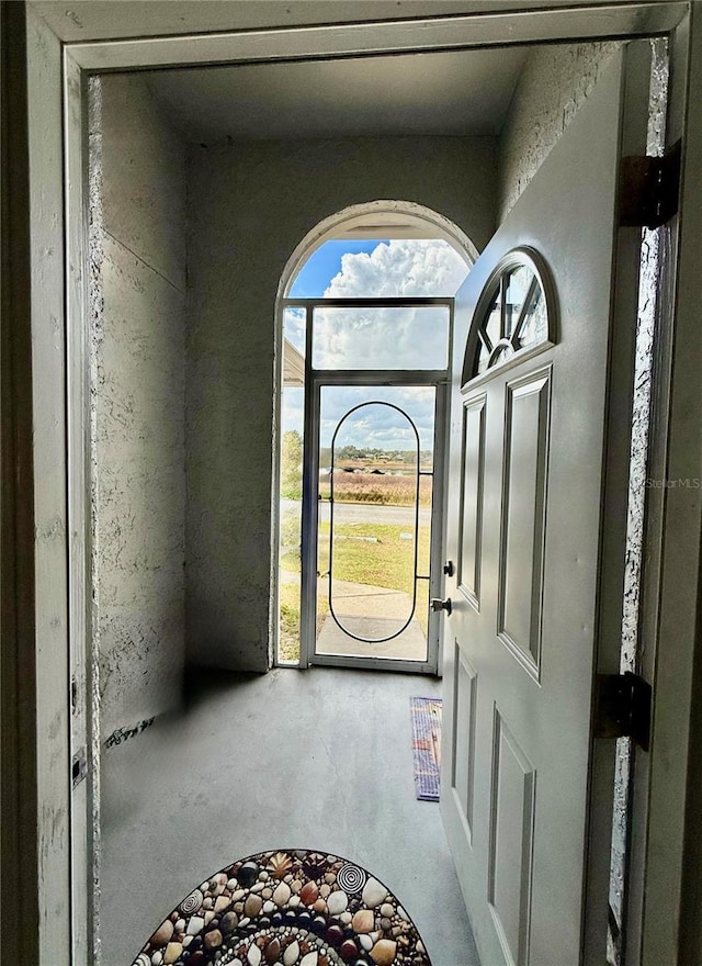 entrance foyer with concrete flooring