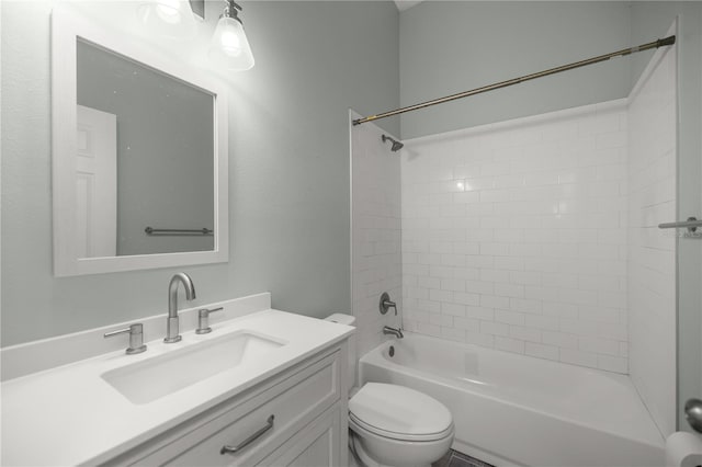 bathroom with shower / bath combination, vanity, and toilet