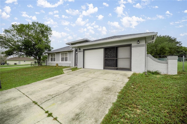 ranch-style house featuring stucco siding, a front yard, fence, a garage, and driveway