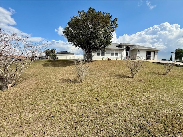 view of yard featuring fence