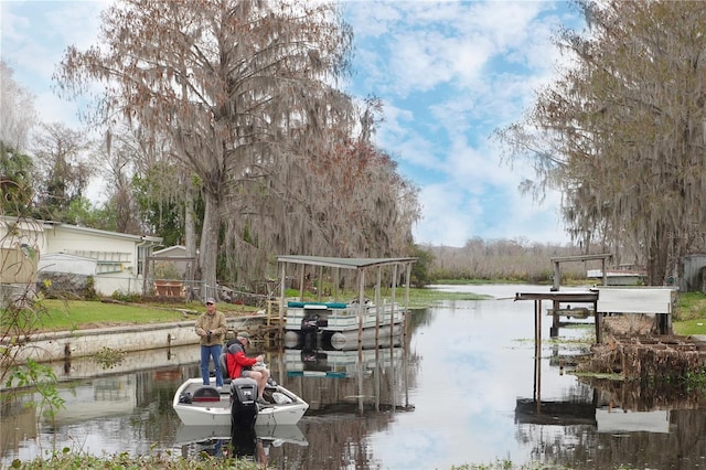 dock area with a water view