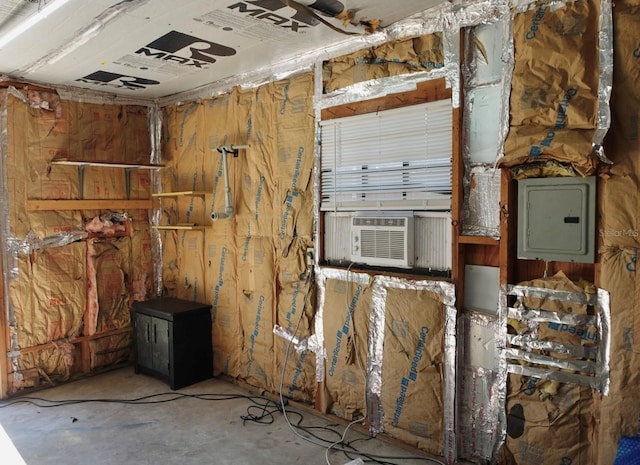 interior space featuring cooling unit and electric panel