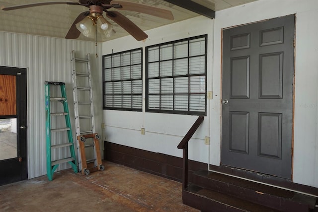 interior space featuring ceiling fan