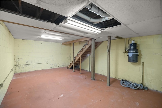 basement featuring a drop ceiling