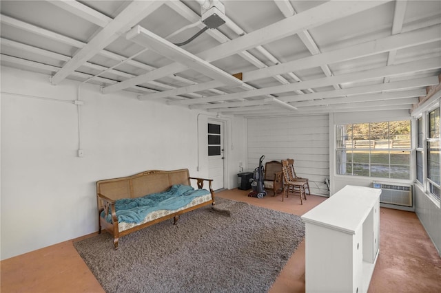 sunroom with a wall mounted air conditioner