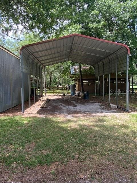 view of car parking with a carport and driveway