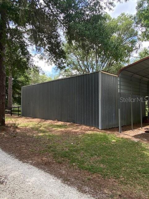 view of yard featuring a detached carport