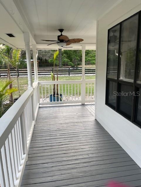 10245 SW 105th St, Ocala, FL 34481 - porch with ceiling fan