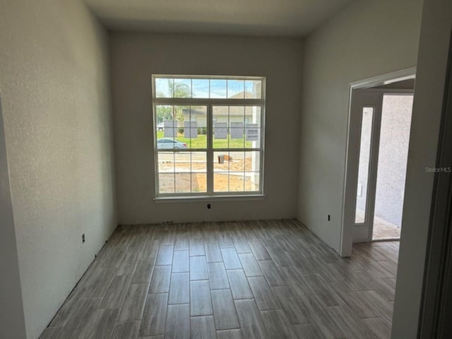 13 NW 45th Loop, Ocala, FL 34475 - spare room with wood finished floors