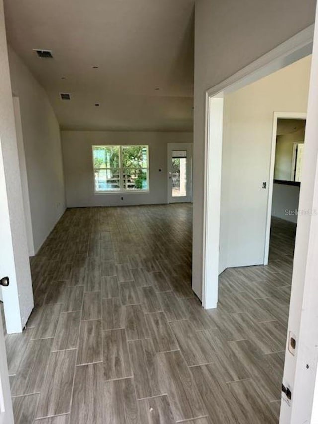13 NW 45th Loop, Ocala, FL 34475 - empty room with wood finish floors