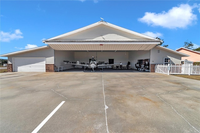 exterior space featuring a carport