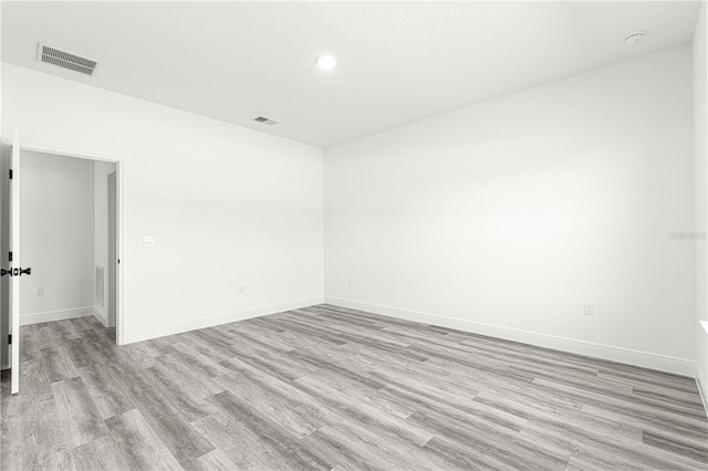 empty room with light wood-type flooring