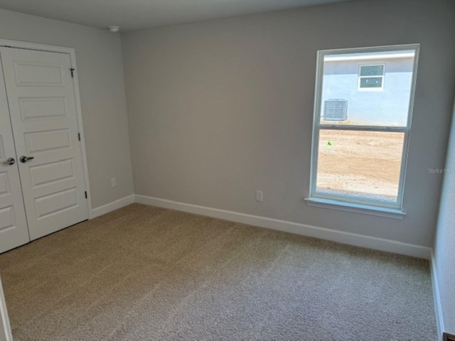 7 NW 45th Loop, Ocala, FL 34470 - unfurnished room featuring carpet flooring and baseboards