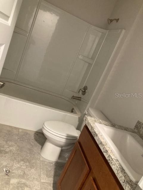 full bathroom with vanity, bathtub / shower combination, and toilet