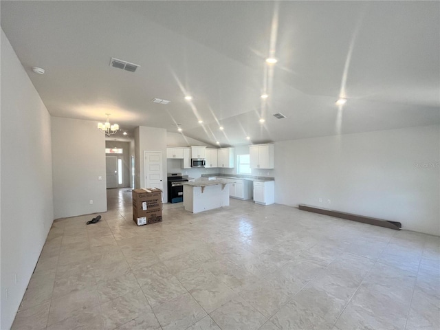 4373 SW 90th Pl, Ocala, FL 34476 - unfurnished living room featuring a chandelier