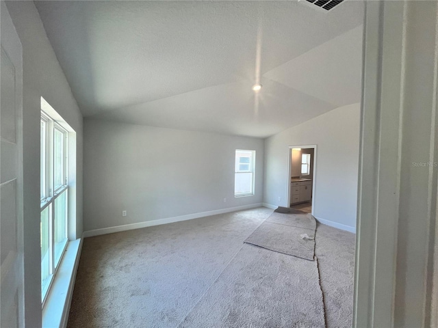 4373 SW 90th Pl, Ocala, FL 34476 - empty room featuring lofted ceiling and light colored carpet