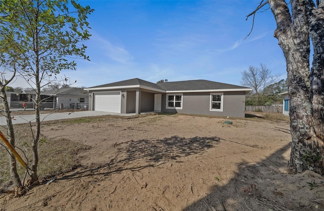 single story home with a garage