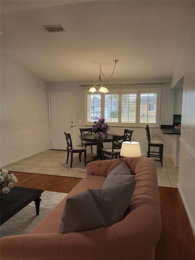 living room with light hardwood / wood-style floors