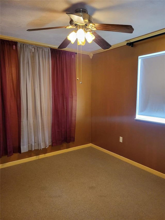 carpeted empty room with ceiling fan