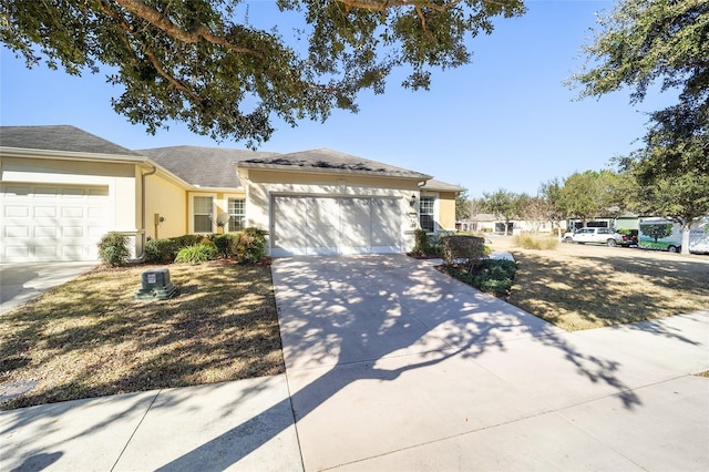 single story home featuring a garage