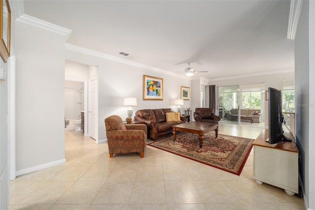 living room featuring ceiling fan, ornamental molding, and light tile patterned floors