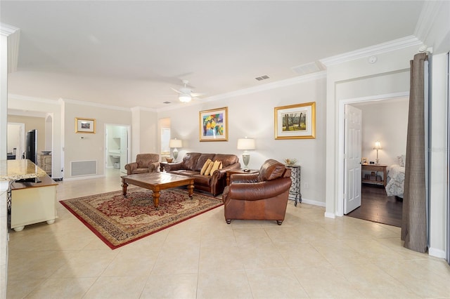 living room featuring light tile patterned floors, crown molding, and ceiling fan