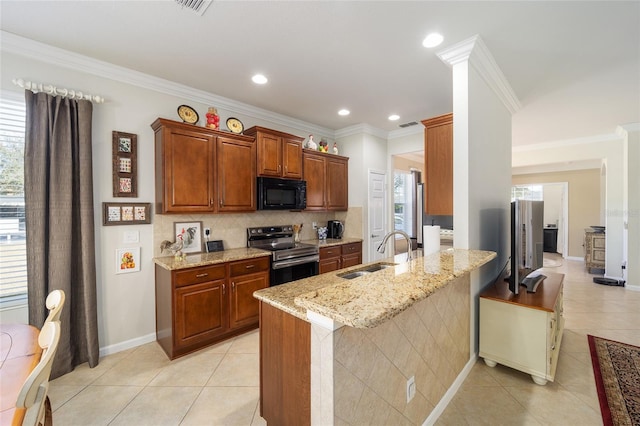 kitchen featuring sink, kitchen peninsula, light tile patterned floors, and stainless steel electric range