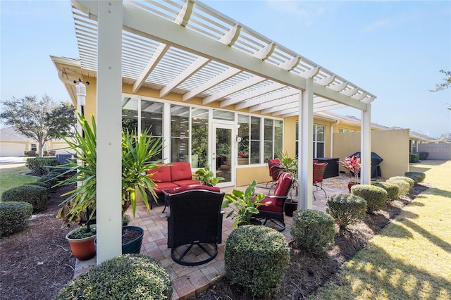 view of patio / terrace with area for grilling, a pergola, and an outdoor hangout area