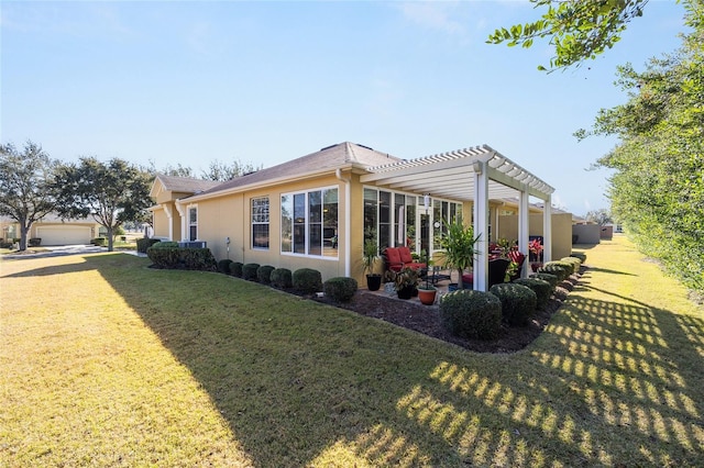 view of side of home with a lawn and a pergola