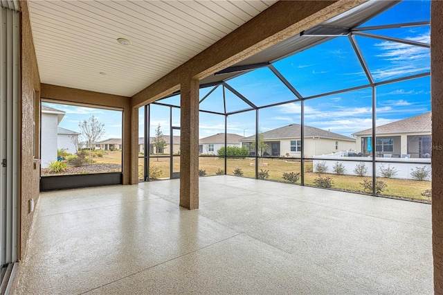 view of patio / terrace featuring glass enclosure