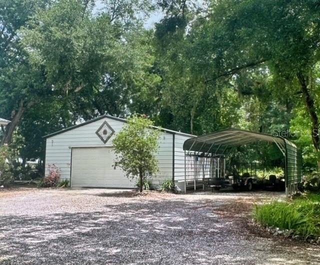 garage with a carport