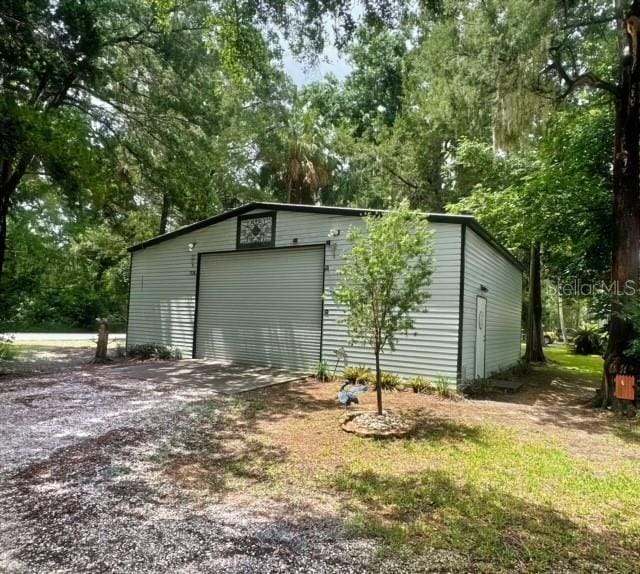 view of outbuilding with a garage