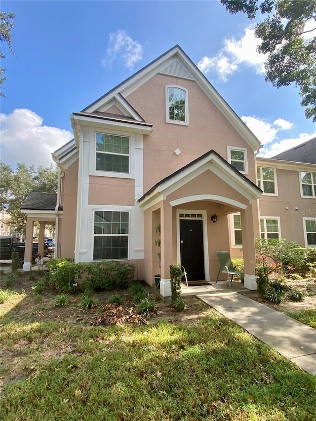 view of front of house with a front lawn