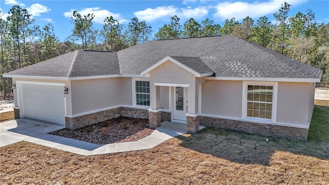 single story home featuring a garage