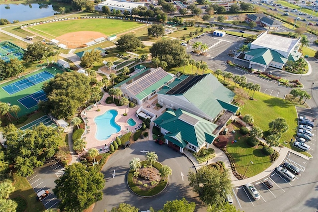 birds eye view of property featuring a water view